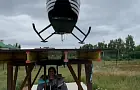 Самый сильный человек России Эльбрус Нигматуллин поставил первый в мире рекорд, подняв вертолет